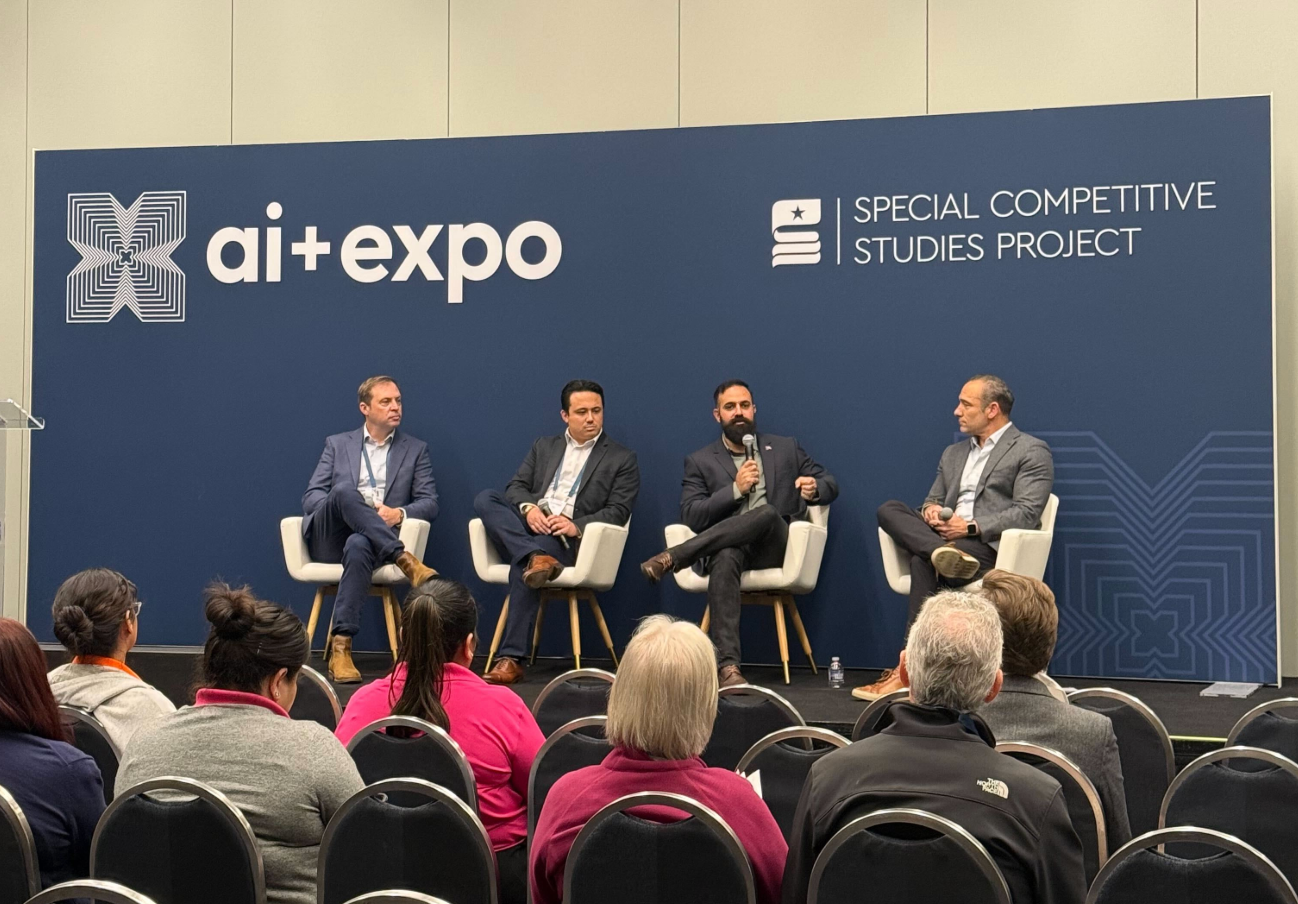 Robots for America Founding Members at AI+ Expo panel discussion, "Robots for America: Driving American Industry Forward." From left to right: Micah Murphy (New American Industrial Alliance), Nick Ayala (GrayMatter Robotics), Edward Mehr (Machina Labs), Dean Banks (Formic). Photo: Robots for America